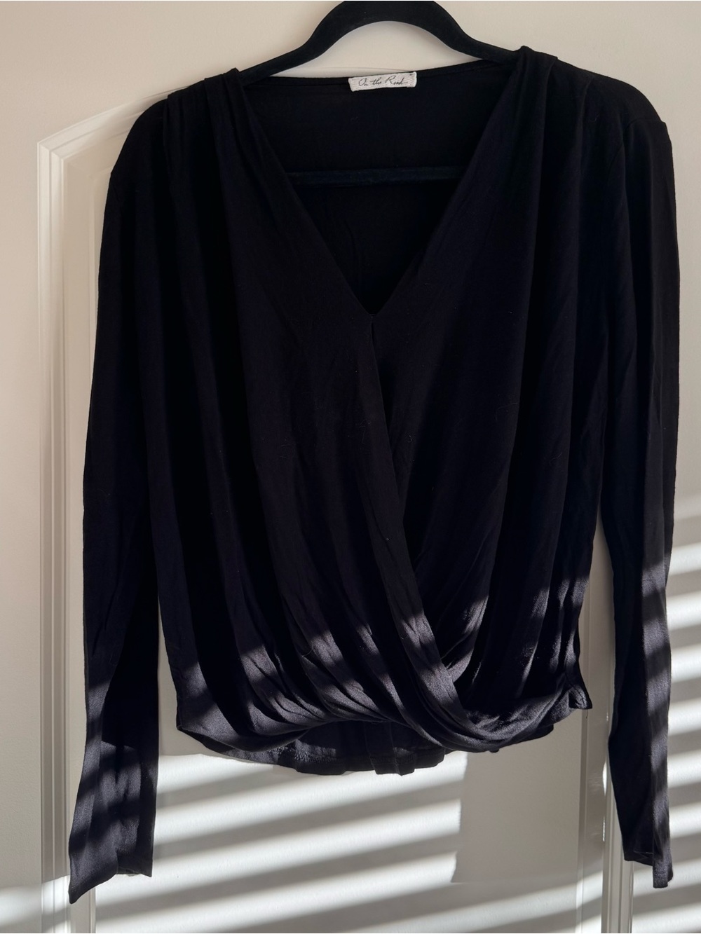 On The Road Black Draped Surplice Long Sleeve Blouse